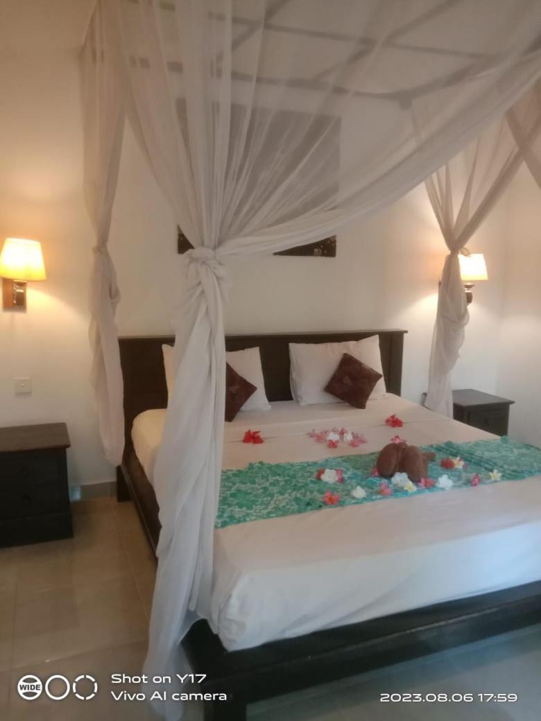 Tirta Bali Homestay ペムテラン エクステリア 写真